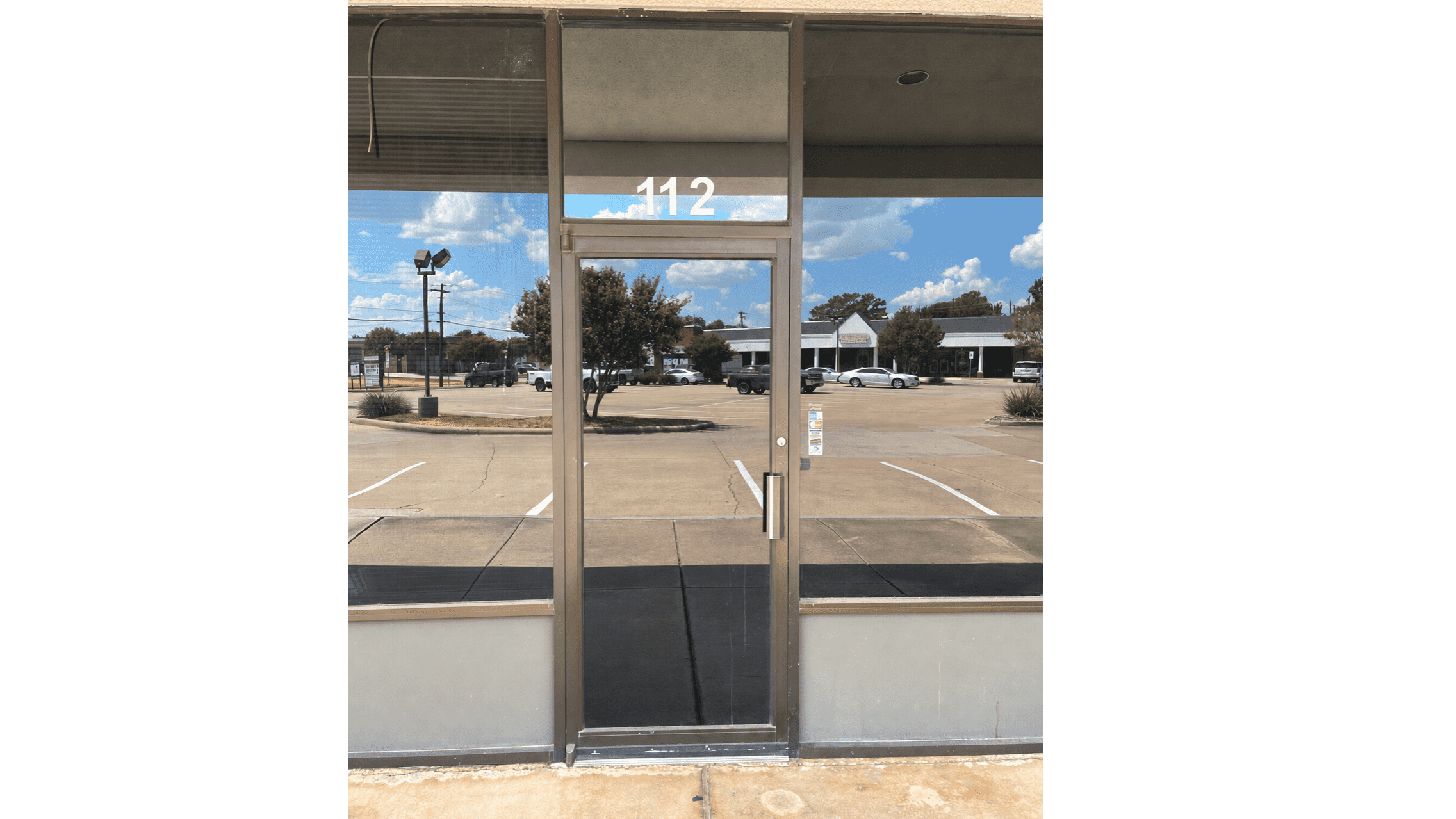 359 Lake Park Rd, Photo - Suite 112 Door Photo Retail Property for Lease - 359 Lake Park Rd, Lewisville, Texas, 75057 (3)